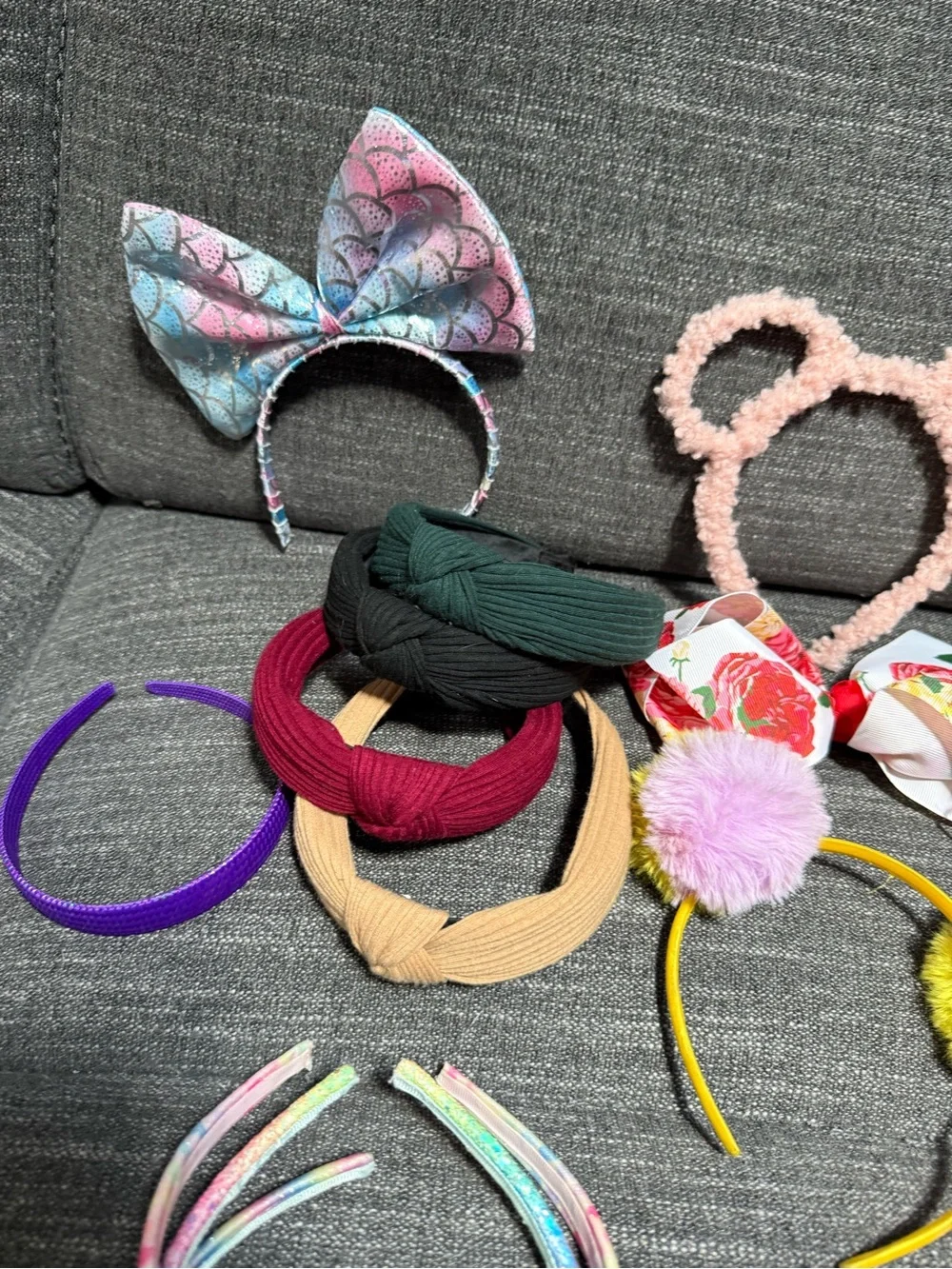 Bundle of girls hair accessories and a small little girls purse.